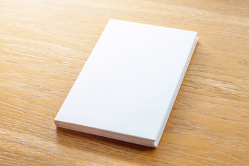 Blank catalog, magazines,book mock up on wood background