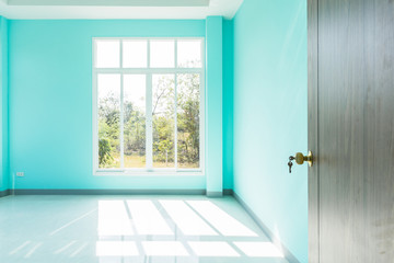 Construction Home Empty Room Blue color interior window white aluminum and Door wooden on wall