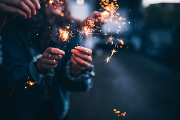 Close-up of bright bruning sparklers in the night