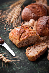 Fresh homemade buns on rustic background
