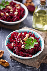 Healthy vegan beetroot salad with walnuts 