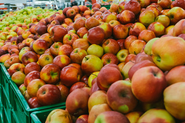 Apples on supermarket shelves