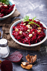 Healthy vegan beetroot salad with walnuts 