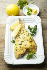 Flatfish, baked with lemon and herbs