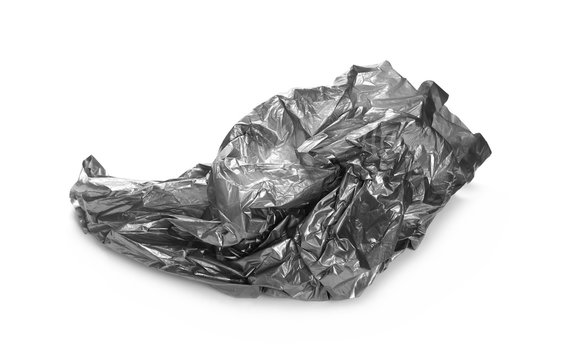 Crumpled grey plastic bag, isolated on white background