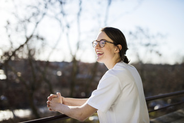 Smiling young doctor looking away