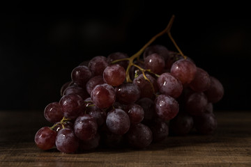 Fresh red grapes, vintage style.