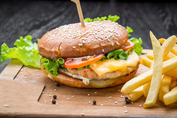 Delicious burgers with beef, tomato