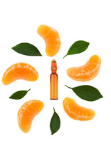 Serum with Vitamin C. One brown ampoule of vitamin C, slices and leaves of mandarin isolated on a white background. Health and Beauty 