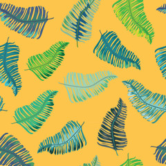 Tropical leaves seamless pattern. Vector illustration on orange background