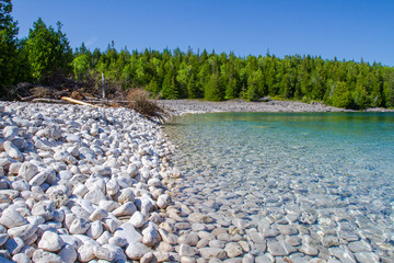 Crystal water and  white stony coastline   at Bruce Peninsula National Park Ontario Canada