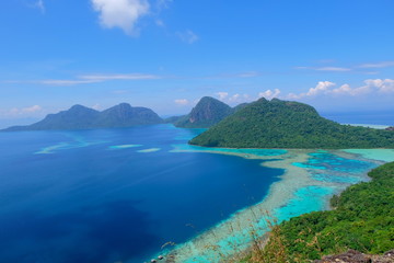 Fototapeta na wymiar The majestic view of corals reef and islands seen from the top of mountain at Bohey Dulang Island, Sabah, Malaysia.