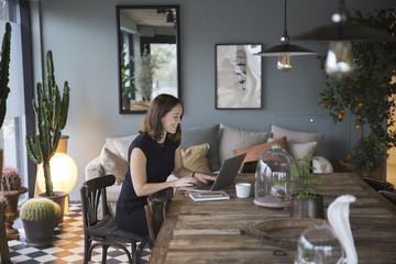 Woman working at a laptop