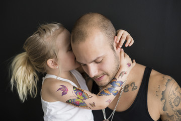 Small girl with butterfly tattoos