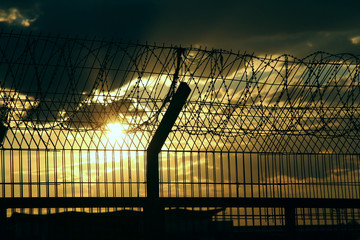 Airport guardrail at the days night stock image
