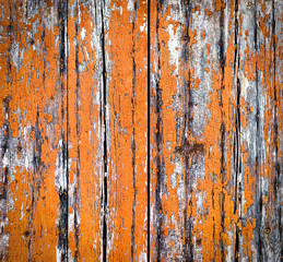 Red cracked paint wooden background