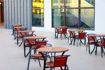 Outdoor dining room chairs in the building. Terrace Dining Chairs.