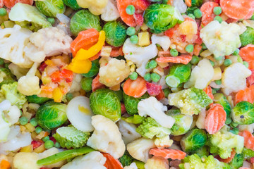frozen vegetable salads in the supermarket for the background