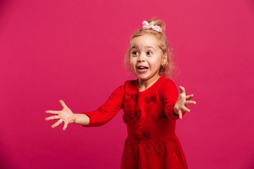 Beauty young blonde girl in red dress wants a hugs