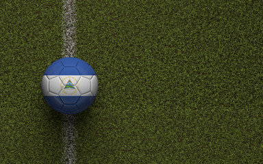 Nicaragua flag football on a green soccer pitch. 3D Rendering