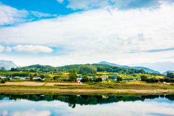 Autumn landscape across the village of Dodamsambong Peaks