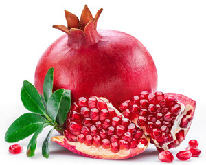 Ripe pomegranate fruits on the white background.
