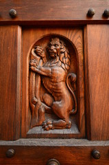 Detail of an old wooden door in the centre of Florence, italy.