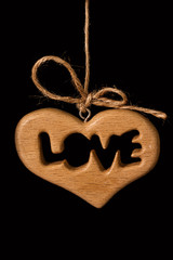  Heart hanging on black background. Valentine day