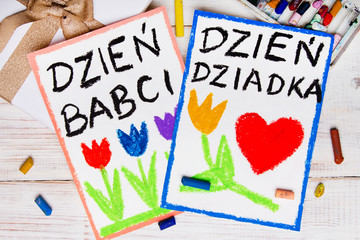 Polish Grandfather's Day and Grandmother' Day card. Colorful hand drawing, crayons and gift box.