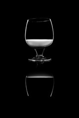 Glass with a white liqueur