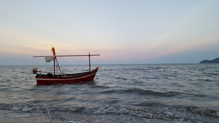 Fototapeta premium The fishery boat floating on the sea