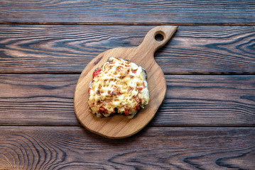 Pork chop with cheese and red pepper 