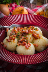 Potato dumplings with bacon.