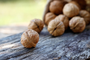 Walnuts on wooden background. health food concept.