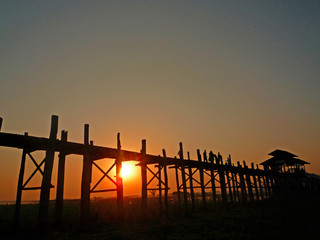 U-bein bridge the longest teak wood in Myanmar while sun set 