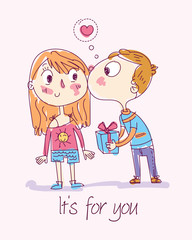 Boy gives gift to girl and kisses cheek