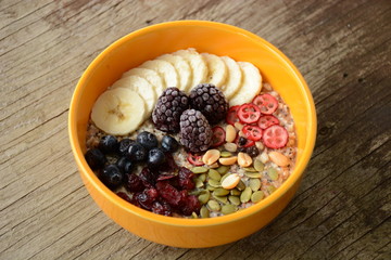oatmeal breakfast with fruits and waffles