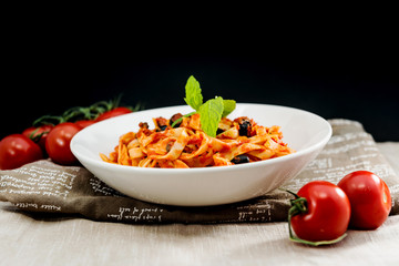 tasty pasta Italian tomato sauce pasta on the table