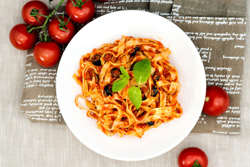 tasty pasta Italian tomato sauce pasta on the table