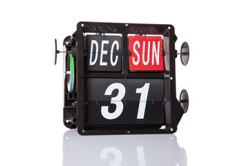 The mechanical calendar retro date 31 December, 2017 on a white background.