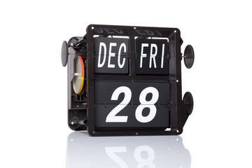 Mechanical calendar retro date 28 December, 2018 on isolated World Cinema Day.