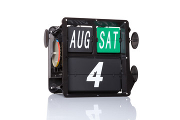 Mechanical calendar retro date 4 August, 2018 on isolated Coast Guard Day.