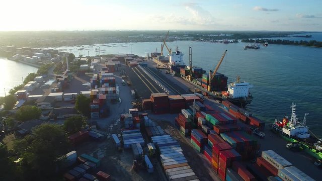 4k movie of Aerial view of container ship anchored in the Shipping Port