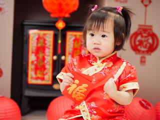 Chinese baby girl  traditional dressing up with a 