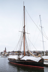 Fototapeta na wymiar Sailing yachts moored in marina in winter