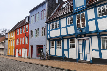 Narrow street with colorful houses. Flensburg