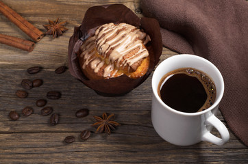 Cup of coffee and muffin