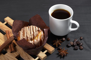 Muffin with cream and coffee