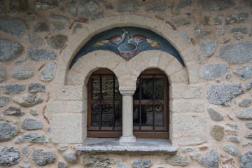 Fototapeta na wymiar The stone windows of the monastry