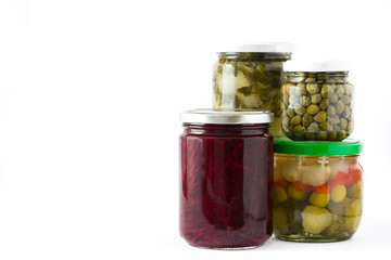 Fermented preserved vegetables in jar isolated on white background. Copyspace


